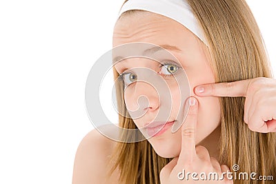 Royalty Free Stock Images: Acne facial care teenager woman squeezing pimple. Image: 19406999