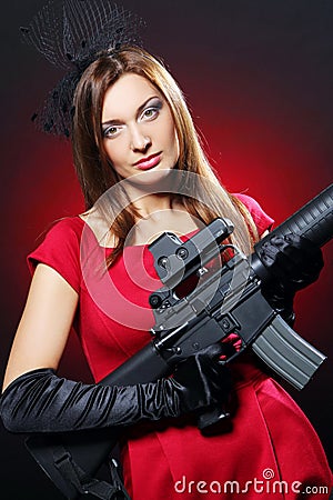 attractive-and-sexy-spy-woman-with-assault-rifle-thumb17260691.jpg