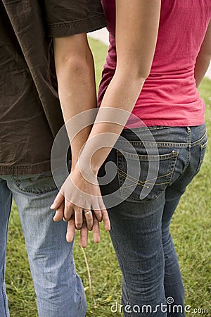 Couples Holding Hands Photography. BACKSIDE OF COUPLE HOLDING