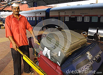 baggage-carrier-at-the-mumbai-railway-station-thumb16230466.jpg