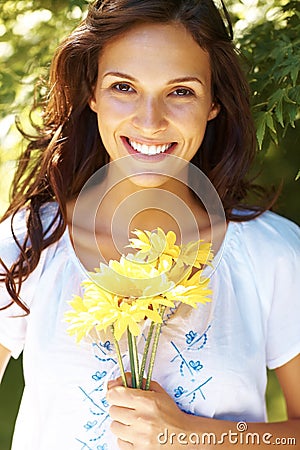 Yellow Flower Picture on Of Beautiful Young Woman In A Park Holding Yellow Flowers   Outdoor