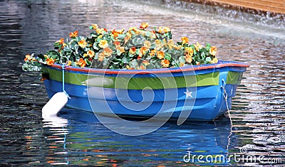 boat-with-flowers-thumb16219798.jpg