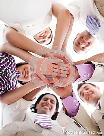 People Holding Hands Together. BUSINESS PEOPLE HOLDING HANDS TOGETHER (click image to zoom)