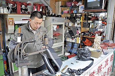 chinese-shoemaker-thumb18813767.jpg