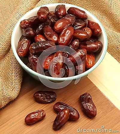 what is a date fruit. Date fruit in white bowl