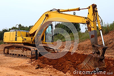 excavator-digging-up-some-ground-and-rocks-2-thumb8646388.jpg