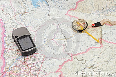   Hiking on Home   Royalty Free Stock Photography  Gps And Compass On Map
