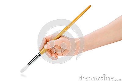 hand holding paintbrush
