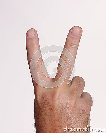 hand-holding-up-two-fingers-thumb10830906.jpg