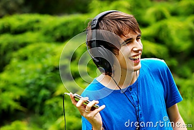 Nice Headphones  Ipod on Happy Teenage Boy In Headphones  Click Image To Zoom