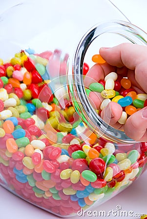 jelly beans jar. Royalty Free Stock Images: Jar and handful of jelly beans