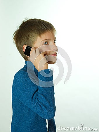 images of people talking on phone. Little boy talking by cell