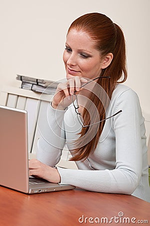 Hair With Glasses. LONG RED HAIR WOMAN AT OFFICE