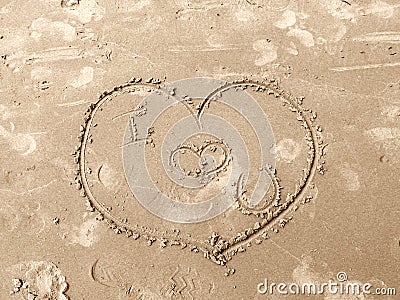 Stock Images: Love heart drawn on sand