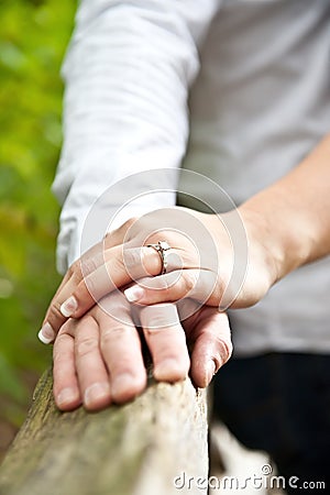 Royalty Free Stock Images: Man and Woman Holding Hands with Ring