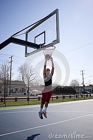 Dunking A Basketball. Man+dunking+a+basketball
