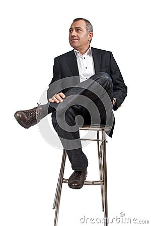 Royalty Free Stock Photo: Man sitting on bar chair. Image: 16908995
