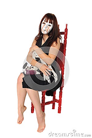 Masked Woman Holding A Doll Stock Photography – Image: 16226422