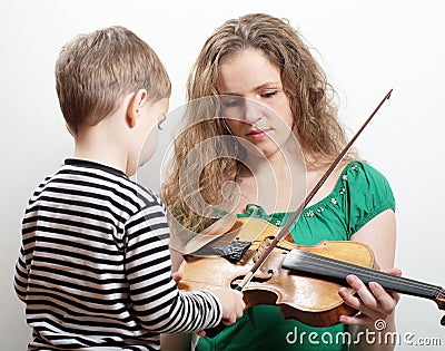 Mother   Songs on Stock Photos  Mother Teaches Son Play Violin  Image  17491583