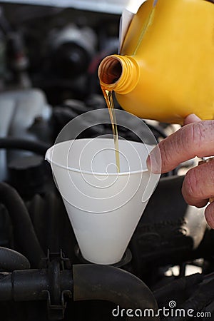 Motor Oil Pouring