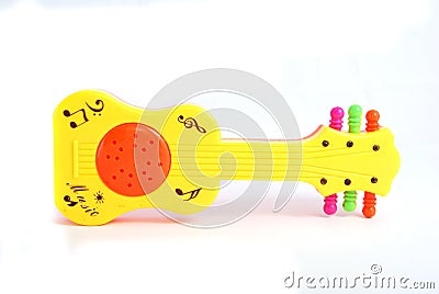 Children’s rattle from plastic on a white background
