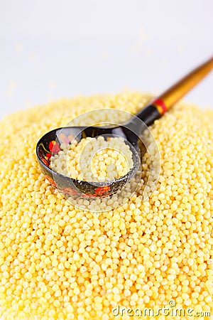 russian-spoon-with-millet-groats-thumb13222650.jpg