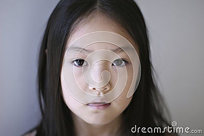 Chinese Girl on Home   Royalty Free Stock Photography  Sad Chinese Girl