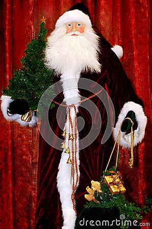 http://www.dreamstime.com/santa-with-a-christmas-tree-and-christmas-gifts-thumb17207967.jpg