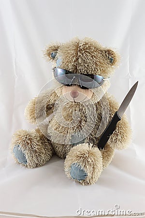 scary-teddy-bear-with-a-knife-thumb6750169.jpg