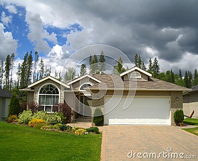 storm-clouds-over-nice-house-in-the-suburbs-thumb194046.jpg