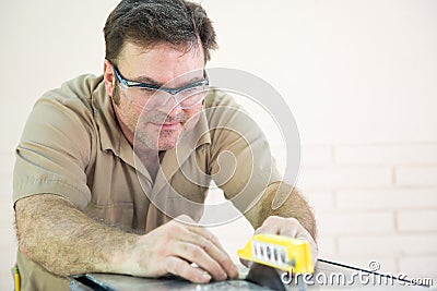 Table   Tile on Royalty Free Stock Image  Tile Cutter Uses Table Saw  Image  8455016