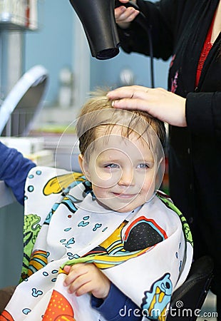 Haircuts For 2 Year Old Boys. A two-year-old boy getting his