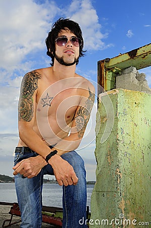 cool guy tattoos. Trendy Guy With Tattoos Stock Image. Trendy Guy With Tattoos Stock Image
