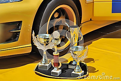  Auto Racing Trophies on Free Stock Image  Trophies And Yellow Racing Car  Image  10514576