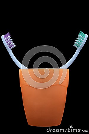 Stock Photos: Two Toothbrushes in the Cup