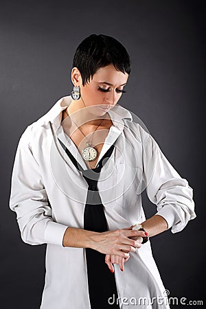 Woman In Big Man Shirt Looking In Watch Royalty Free Stock Photo