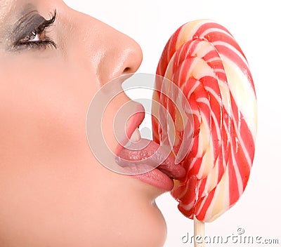 Woman Licking Lollipop Stock