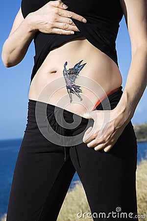 Woman with fairy tattoo.