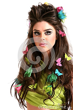 YOUNG WOMAN WITH HIGH FASHION MAKEUP AND HAIRSTYLE (click image to zoom)